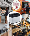 Hustle Free Automatic Puck Shooter Knock Box; black and white design for espresso coffee residue disposal in a home kitchen.