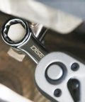Hardworking SAE Torque Adapters 9 Piece Set for Wrenching in use on bolt with ratchet handle, close-up view