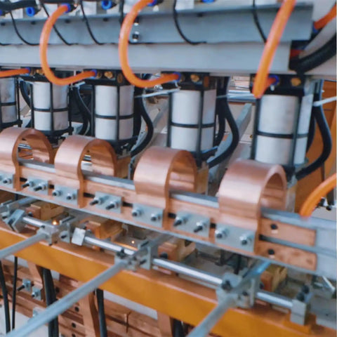 Fully Automatic Wire Mesh Welding Machine For Reinforcing Wire Cloth, close-up of welding nodes and copper clamps in action.