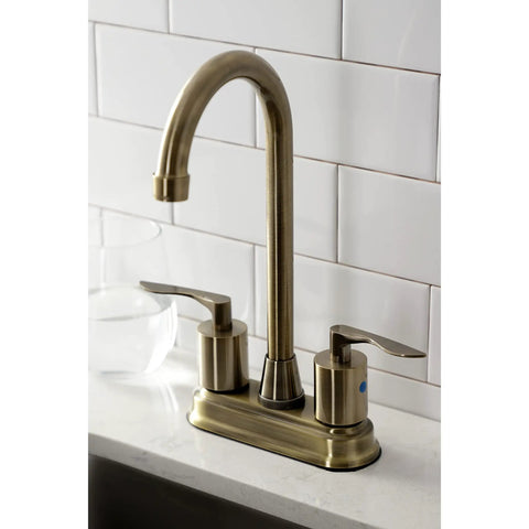 Serena Two Handle Deck Mount Bar Faucet In Antique Brass With Two Hole Four Inch Centerset Washerless Cartridge Half Inch To Fourteen NPSM Connection 1.8 GPM Flow Solid Brass Build For Your Home Bar