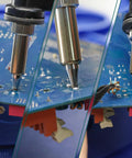 Pro Grade 110W EVO Soldering Station And Desoldering Kit With Vacuum Pump in use on circuit board