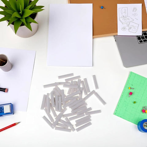50 White Cylinder Eraser Refills 5x25mm For Mechanical Pencils Top Notch Premium Rubber Erasers scattered on a desk