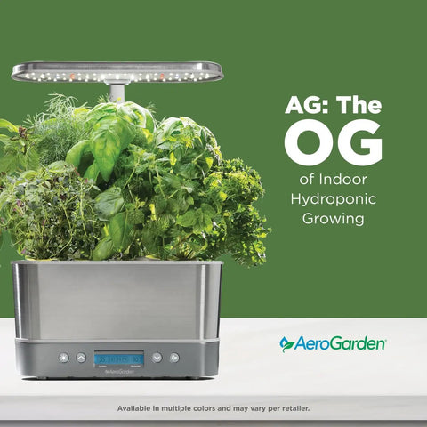 Harvest Elite Indoor Garden Hydroponic System With LED Grow Light And Seed Kit Stainless Steel Countertop Garden Holds Up To Six Pods For Fresh Herbs Vegetables And Flowers No Mess Soil Free shown in use