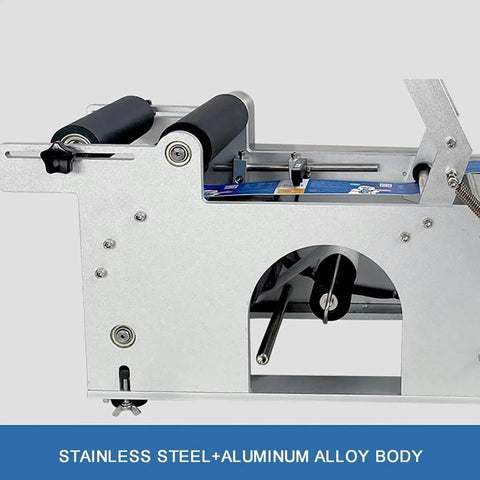 Semi Automatic Desktop Label Applicator For Round Bottles 15 To 120Mm With Integrated Date Coder and Self Adhesive Sticker Tagging Setup showing stainless steel and aluminum alloy body.