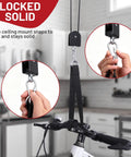 Close-up of 2 Pack Bike Ceiling Hoist Storage System for Garage Weight Lifting Gear with locking mechanism and pulley.