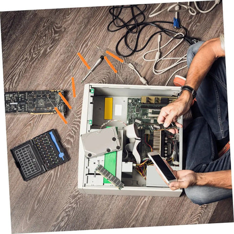 Technician using Six Piece Soldering Assist Set Desoldering Pump And Wick Kit For PCBs on computer components