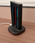 Controller Fast Charging Station With Touch Glow Lights For Nintendo Switch 2 Featuring 9 Color Breathing Modes Instant Status Tracking Quick Plug Play Gaming Rgb Vibe Dock on wooden surface
