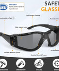 Premium Wrap Around Antifog Safety Glasses With Protective Eyewear And Foam Seal Gasket Offering Kick Ass Impact Shield And Snag Free Vision On Heavy Duty Worksites Daily with dark lenses and durable black frame.