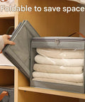 Heavy Duty Extra Large Storage Bins Foldable Moisture Resistant Moving Bags With Clear Window stacked on a shelf with folded towels.