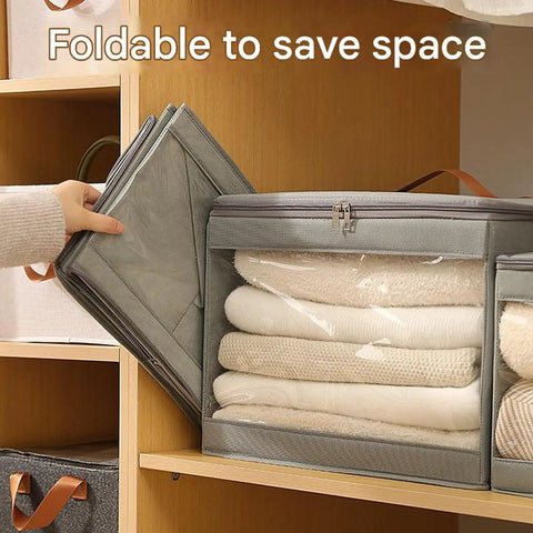 Heavy Duty Extra Large Storage Bins Foldable Moisture Resistant Moving Bags With Clear Window stacked on a shelf with folded towels.