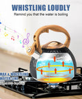 Stovetop Tea Kettle 3.2 Quart Stainless Steel Whistling Teapot With Wood Pattern Handle on gas stove, black finish