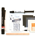 Bathtub And Shower Pan Repair Kit For Kohler White Non Toxic Fume Free Safe To Apply Fast And Easy To Use With High Output LED Light Perfect For Touch Ups tools and materials laid out.