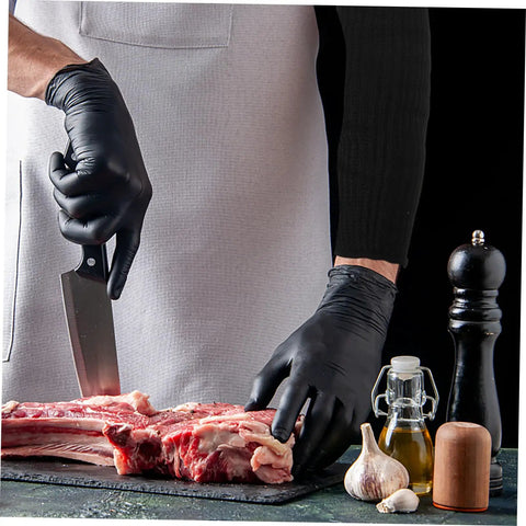 2 Pack Cut Resistant Arm Sleeves Hella Tough Pe Guard Top Shelf Protection For Gardening Welding Metalwork And Crafting Keep Your Forearms Beat Proof With Ergonomic Fit And Lightweight Portability For Pros And DIYers, black sleeves worn while cutting meat.