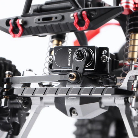 Close-up of the Beefy 11Kg Coreless Servo With Metal Gear For 1/18 RC Crawler Upgrades, mounted with a steering link.
