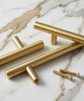 Heavy Hitter Solid Stainless Steel Bar Handles 25 Pack Euro Style Cabinet Pulls With Killer Brushed Satin Gold Brass Finish showing 3 handles and screws