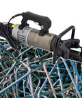 Heavy Duty Electric Hydraulic Rebar Bender With Beast Mode Setup No Sweat Handling For Steel Copper Rods Zero To Ninety Degree Bend Angle Pro Contractor Job Site Essential on a pile of rebar.