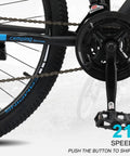 Close-up of 27.5 Inch Mountain Bike With Suspension Fork, Dual Disc Brakes, 21 Speed Shifting, pedal and gear system visible