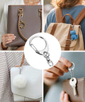 Pack Of Fifty Silver Lobster Claw Clasp Keys With Swivel Snap Hooks And Mini Jump Rings attached to various bags and keychains.