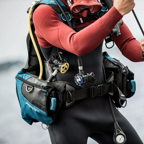 Person wearing Ultra Compact Pro Octopus For Scuba Diving with Pneumatically Balanced Breathing Venturi Switch, visible yellow hose