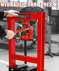 6 Ton Hydraulic Shop Press With H Frame Built Tough For The Garage Adjustable Height From 2.2 To 9.4 Inches Pressure Gauge Stamping Plates Bearings And U Joint Installations For Bending Straightening And Pressing Automotive Or Metalworking Parts displayed in a workshop.