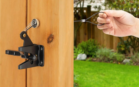 Top Shelf Spring Loaded Gate Latch Cable Pull Kit attached to wooden fence, hand holding the cable pull for easy use.