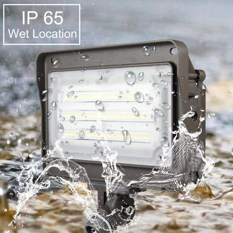 LED Flood Light Outdoor With Dusk To Dawn Photocell 50W 6500LM IP65 Waterproof shown being splashed with water