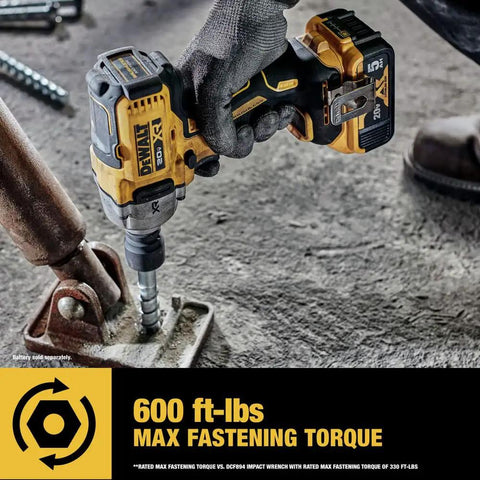 Heavy Hitter 20V Max Cordless Impact Wrench Half Inch Drive Bundle in use, demonstrating high torque on a fastener.
