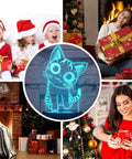 Cat Night Light 3D Illusion Lamp with Seven Color Auto Change surrounded by festive holiday scenes and families with gifts.