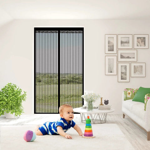 Living room with a Magnetic Screen Door For Doors Up To 37 By 82 Inches, Self Sealing Mesh Magnetic Closure, black, with a baby playing.