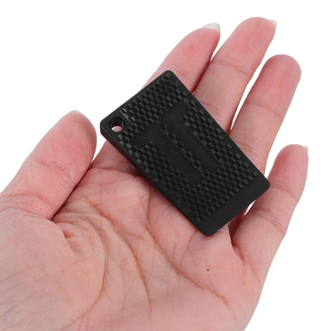 Adjustable Furniture Leveling Shims And No Slip Appliance Stability Pads in hand, black textured pad for home use.