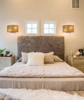 Bedroom with Rattan Wall Sconce Boho Light Fixture Hand Woven Hemp Rope Sconce Lighting illuminating a cozy modern vintage vibe