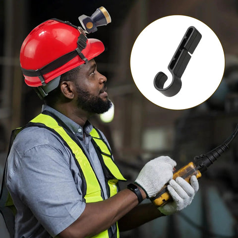 Worker using 52 Pcs Hard Hat Clips for Headlamp LED Light, easy mount on narrow edges, anti-slip, stable for construction site work.