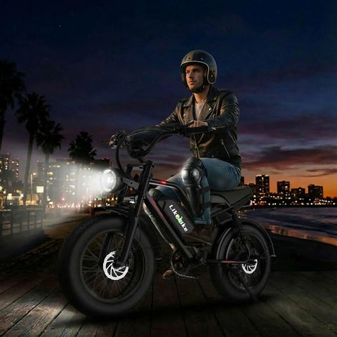 Rider on Beast 2000W Electric Fat Tire Bike For Adults With Top Speed 36 MPH, city skyline backdrop at night