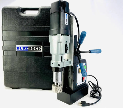 Knockout Performance Heavy Duty Magnetic Drill Press Built Like A Tank For Real Contractors With Two Speed Settings Three Inch Capacity And 1850 Watt Muscle For Any Metal Project next to its black carrying case on a white background.