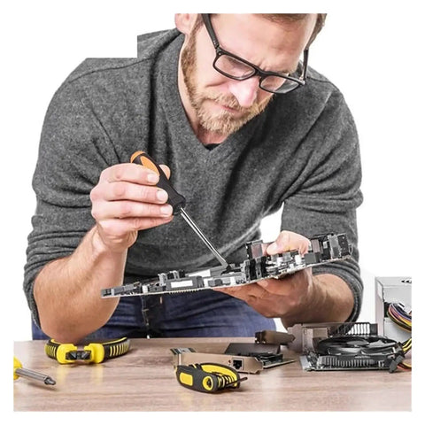 Man using screwdriver from All-In-One 108-Piece Socket Wrench Auto Repair Tool Set With Heavy-Duty Hand Tools And Storage Case on circuit board.
