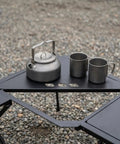 Folding Table Corner Brackets For Camping In Stainless Steel with teapot and cups on 90-degree triangle connection plates
