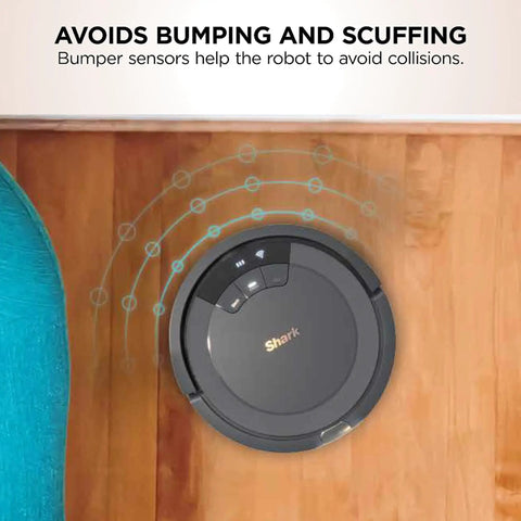 Top view of Ion Robot Vacuum With Tri-Brush System And WiFi Connectivity, 120 Minute Runtime, Works With Alexa, No-Fuss Multi Surface Cleaning For Carpets And Hard Floors, Grey, avoiding obstacles on hardwood floor.