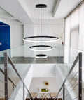 Cool Black LED Chandelier With 3 Color Temps 3000K 4000K 6000K, 60W Hanging Light Fixture in modern entryway with glass railing