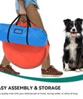 Person carrying Dog Agility Training Kit For Backyard And Indoor Use With Teaser Pole and black dog sitting