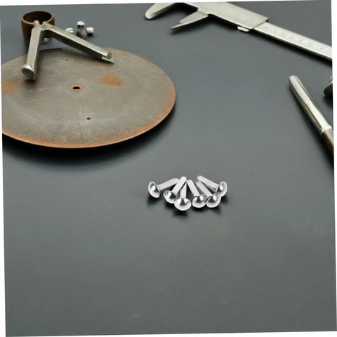 Close-up of silver split pins from 100 Piece Doll Joints Puppet Craft Kit For Kids And Grownups Scrapbook Fasteners And Split Pins For DIY Projects