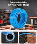 Heavy Duty Pro Grade 300 Foot Air Compressor Line Kit With Three Quarter Inch HDPE Aluminum HDPE Three Layer Tubing For Garages And Workshops Leak Proof Pressure Resistant Easy To Install coiled on workbench with tools