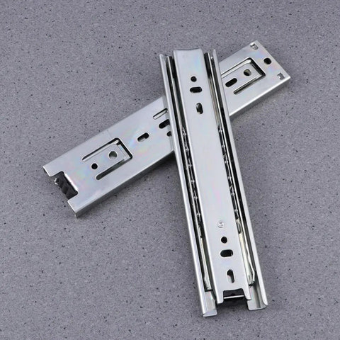 Two Pack Heavy Duty Steel Ball Bearing Drawer Slides With Buttery Smooth Gliding Action Built For Kitchen Storage Cabinets And Desk Pedestals Zero Fuss Telescopic Hardware Rails on a grey background.