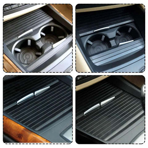 Hella Durable Center Console Cup Holder Slide Cover Featuring Slick Gliding Roller Blind Shutters For BMW X5 And X6 Models showing two-piece black slider trays in vehicle's interior.