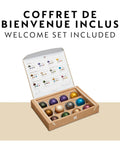 Vertuo Next Single Serve Coffee And Espresso Maker with Aeroccino Milk Frother welcome capsule set in open box.