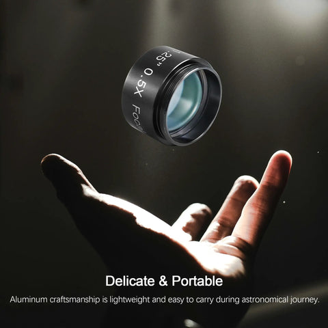 Hand holding 0.5x Telescope Focal Reducer For Imaging And Visual Telescopes, 1.25 Inch Filter Thread, Fully Multi Coated Field Corrector.