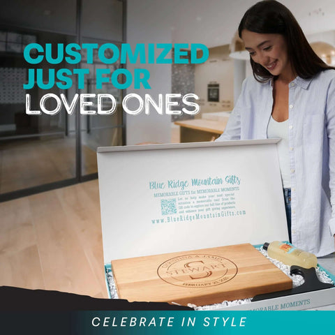 Wood cutting board, personalized laser-engraved, in an open gift box with Blue Ridge Mountain Gifts branding.