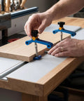 Heavy Duty T Track Clamps With Spring Nut Offer Adjustable Pressure Plate Slider For Woodworking And Metal Milling Tables Featuring 100mm Clamping Range to secure wood on a table.