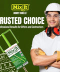 Mix It 20 Inch Mud And Paint Mixer With Durable ABS Paddle and smiling worker in hard hat on green background.