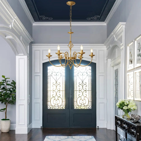 Gold Farmhouse Chandelier With Six Candle Style Lights, Rustic Industrial Pendant Light, 26 Inch Antique Brass Finish in Entryway
