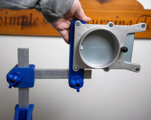 Kickass Adjustable Dust Collection Rig For Split Bed Wood Lathes With Tight Four Inch Hose Hookup And Three Way Flex Brackets showing the cast aluminum gate.